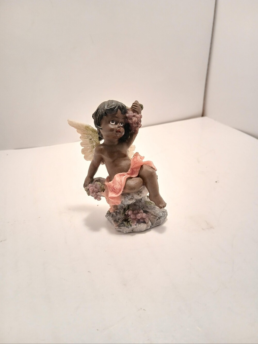 Hand-Painted Cherub Sculpture in Black and Cream with Pink Drapery